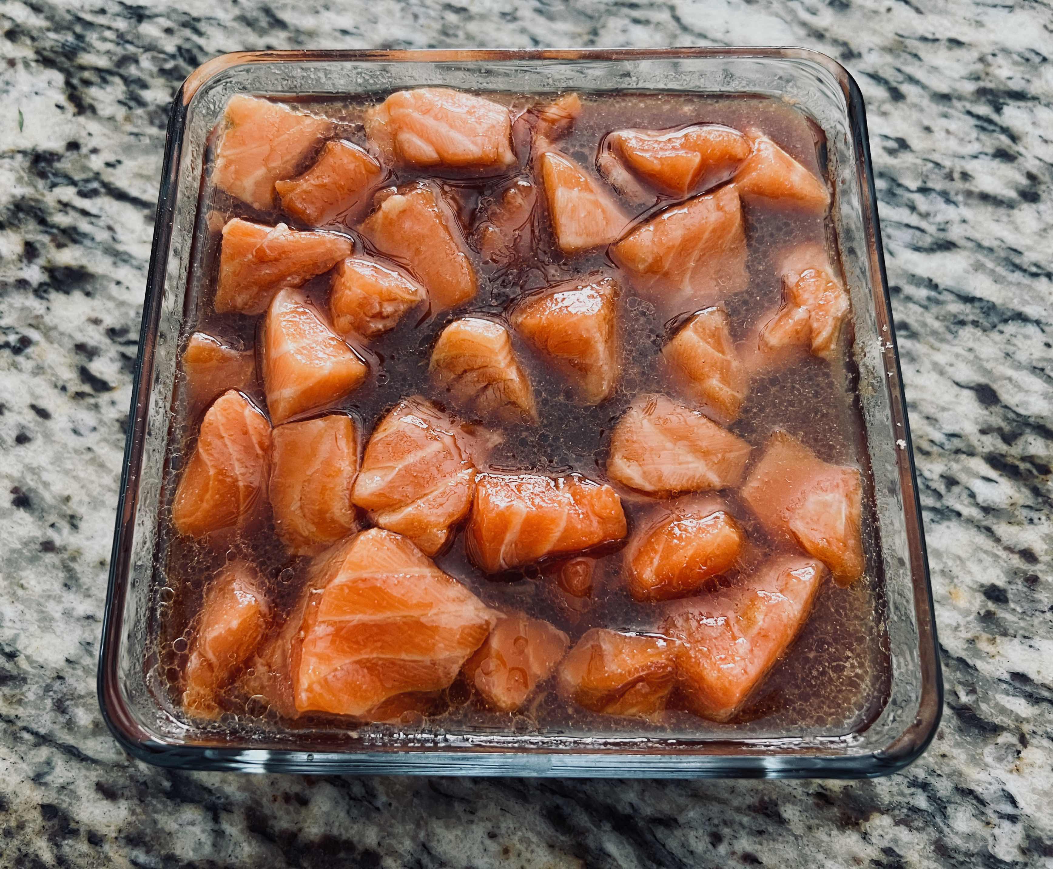 Cubed salmon in marinade